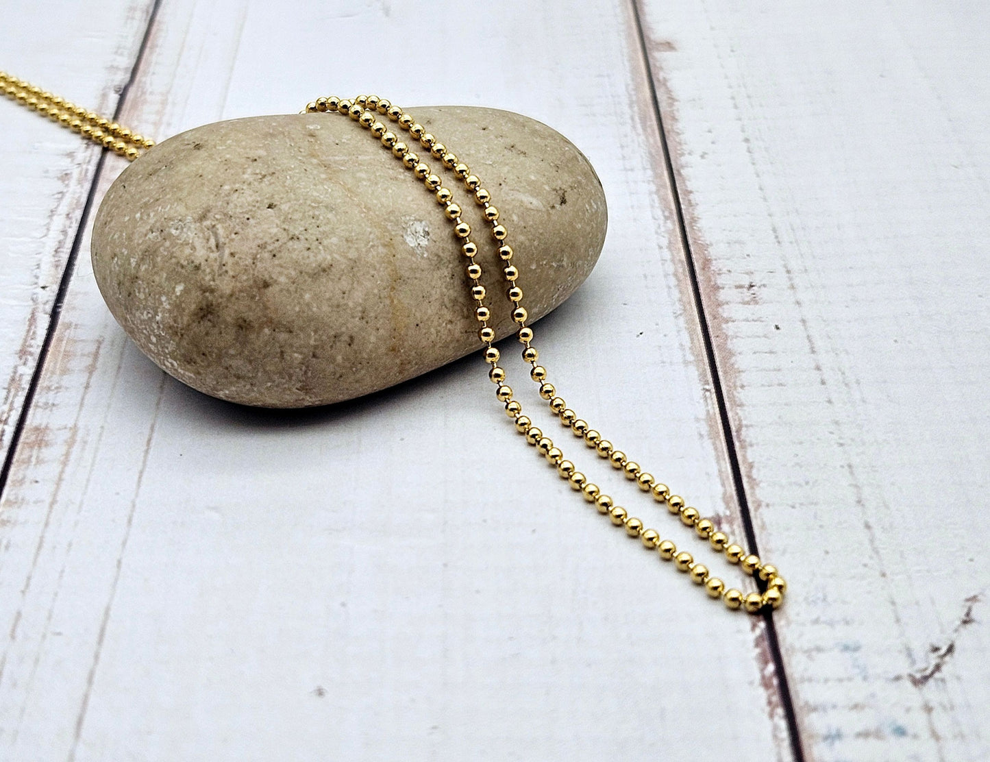Chaîne à billes 1,5mm acier inoxydable doré, au mètre