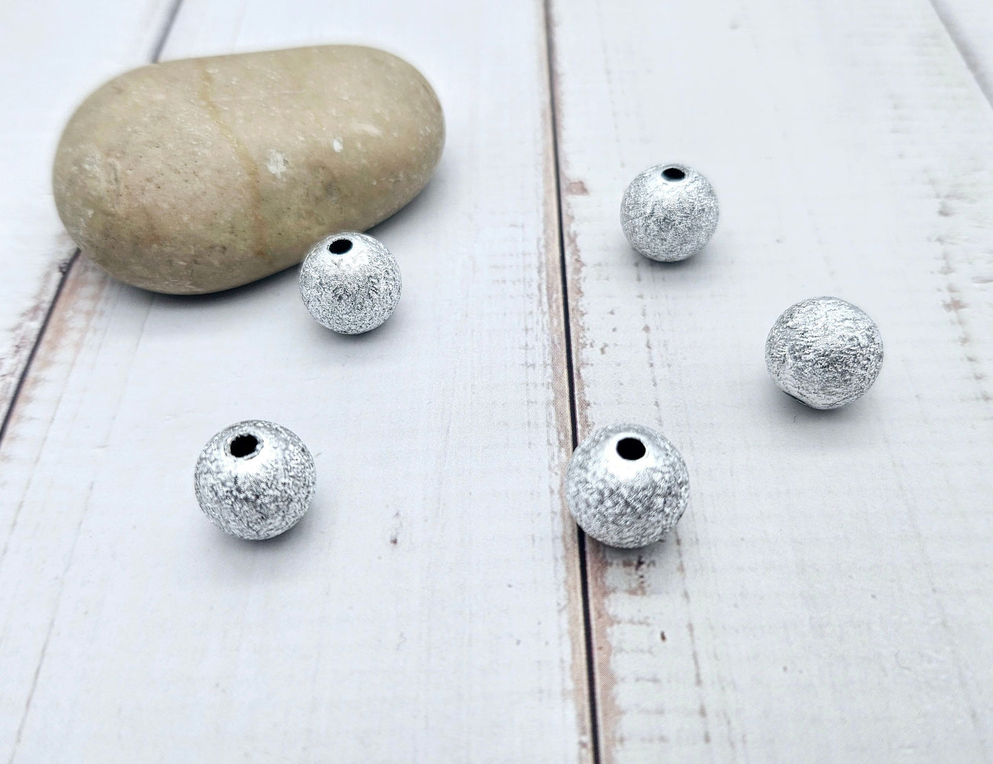 50 perles stardust argentées 12mm