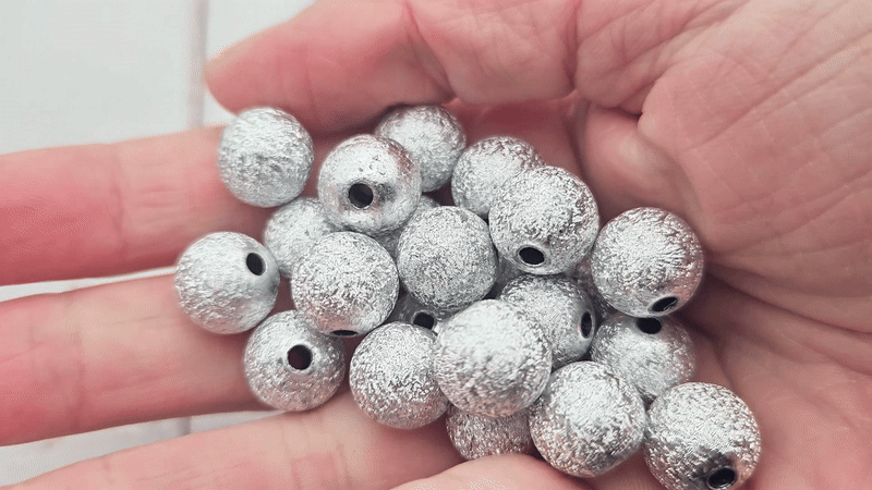 50 perles stardust argentées 12mm