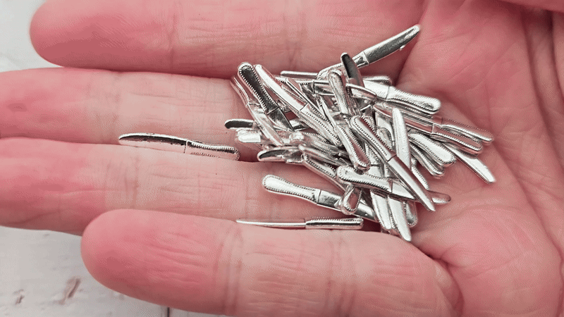 50 miniatures couteaux argentés