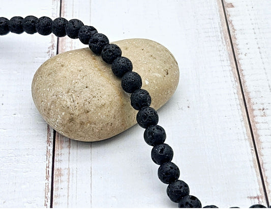 60 perles de lave rondes noires 6mm