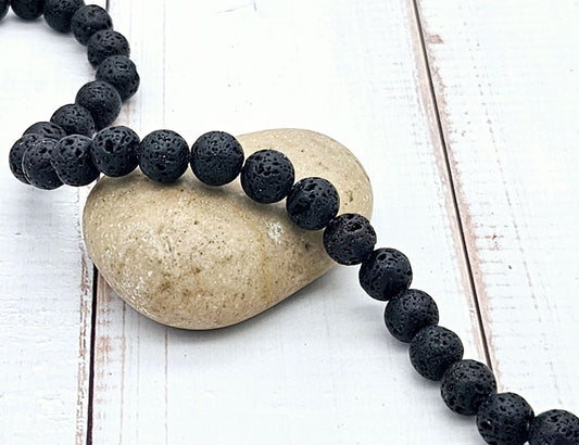 46 perles de lave rondes noires 8mm