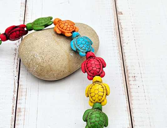 22 perles tortue multicolores en turquoise synthétique