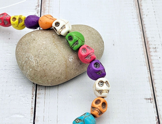 37 perles tête de mort multicolores 10x8mm