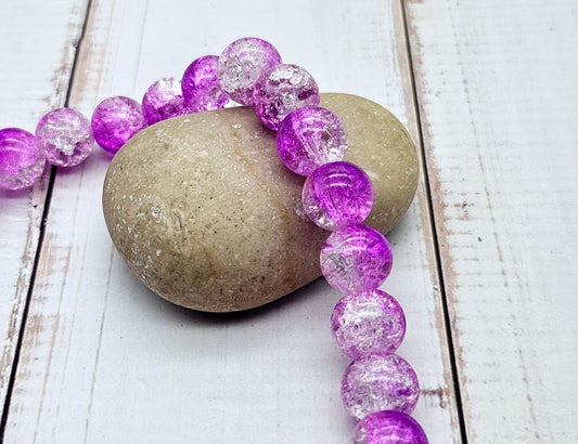 80 perles en verre craquelées violettes et transparentes 10mm