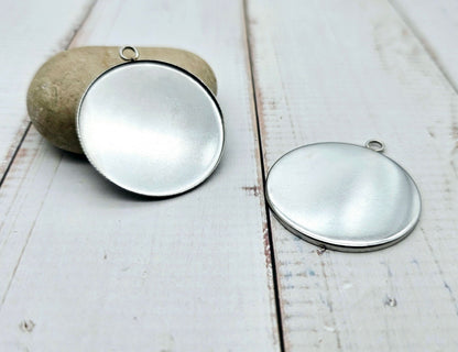 10 pendentifs plateau cabochon 35mm en acier inoxydable