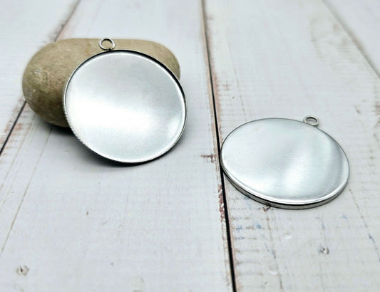 10 pendentifs plateau cabochon 35mm en acier inoxydable