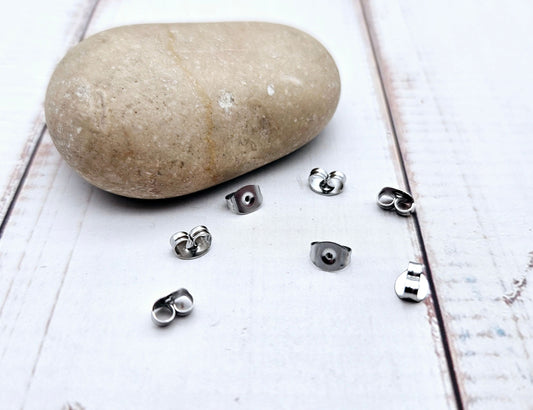 50 bouchons stoppeurs papillons acier inoxydable pour boucles d'oreilles
