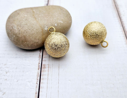 2 pendentifs bola texturé bille sonore or