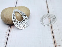 10 estampes ajourées coeurs forme goutte acier inoxydable