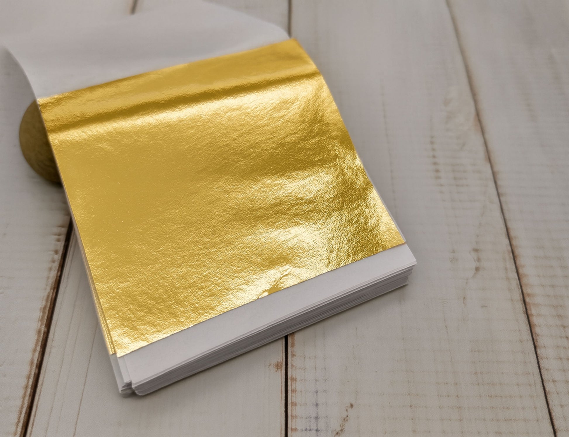 100 Feuilles à Dorer - Imitation champagne or (8x8 cm)