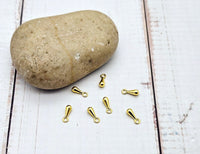 200 breloques gouttes 7mm couleur or