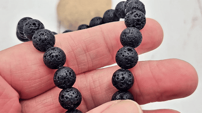 46 perles de lave rondes noires 8mm