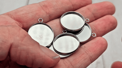 10 pendentifs plateau cabochon 18mm en acier inoxydable