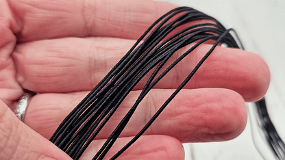 Fil élastique noir 1mm – 22 mètres
