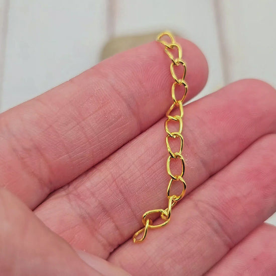 100 chaînettes d'extension maille courbée couleur or