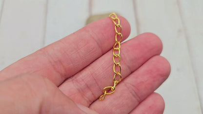 100 chaînettes d'extension maille courbée couleur or