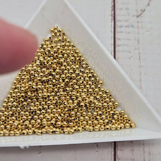 500 perles rondes 2mm acier inoxydable doré