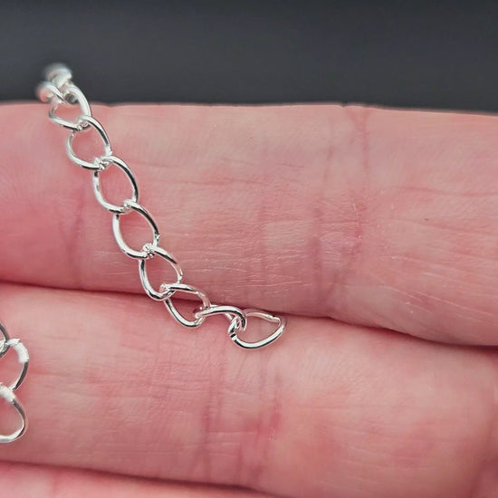 100 chaînettes d'extension maille courbée couleur argent clair