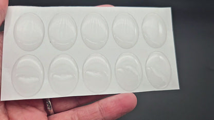 10 cabochons autocollants ovales 25x18 mm en résine époxy
