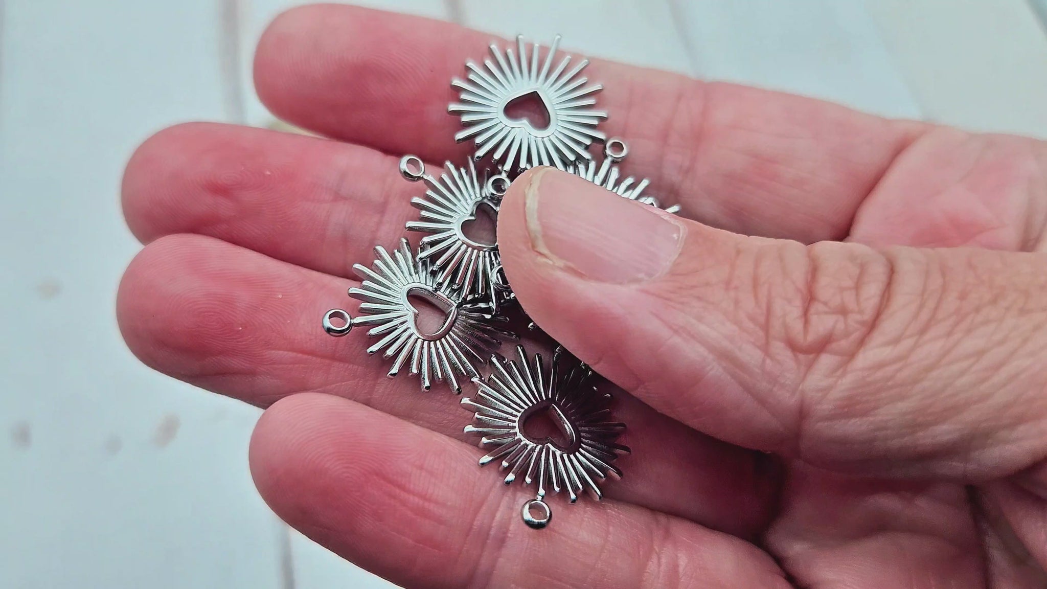 4 breloques soleil coeur acier inoxydable