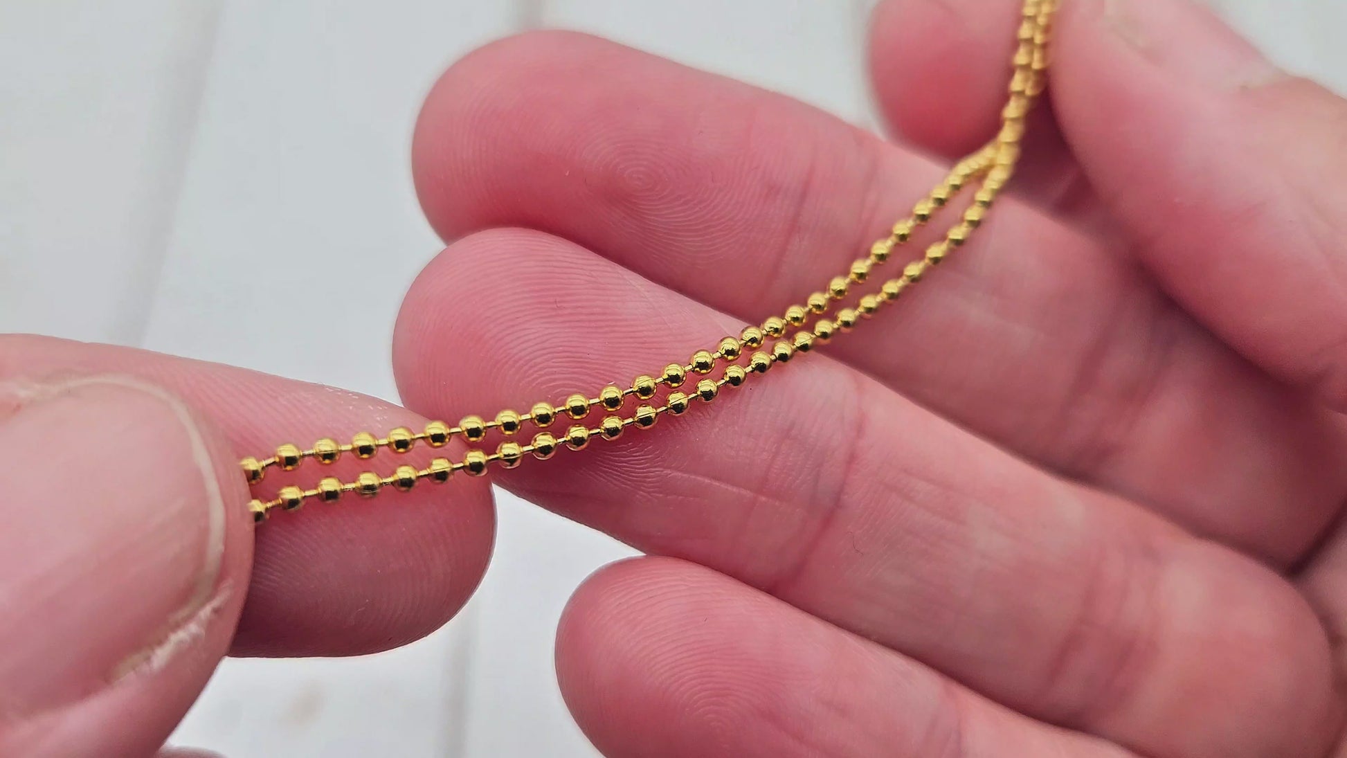 Chaîne à billes 1,5mm acier inoxydable doré, au mètre