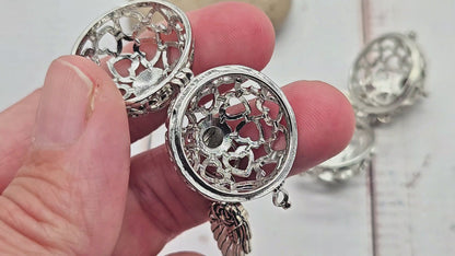 2 cages coeurs avec breloque aile pour création bolas de grosesse