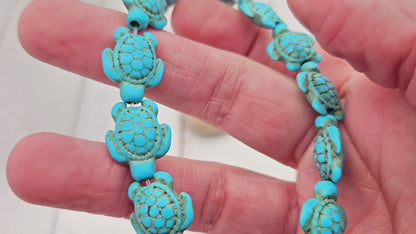 23 perles tortue en turquoise synthétique