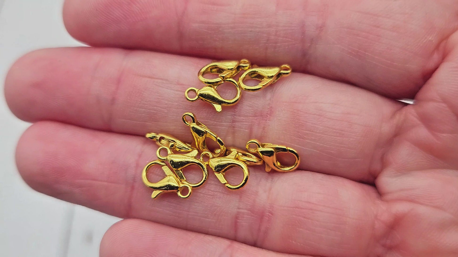 20 fermoirs mousquetons 10x5mm couleur or