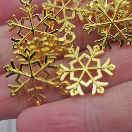 10 breloques flocon de neige couleur or