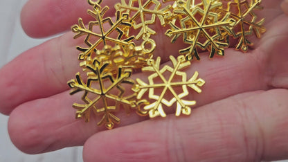 10 breloques flocon de neige couleur or