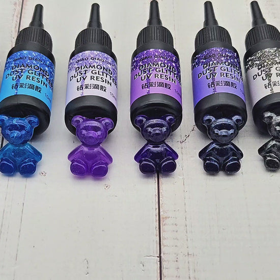 6 flacons de résine UV pailletée série violette
